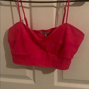 Spaghetti strap pink crop top.